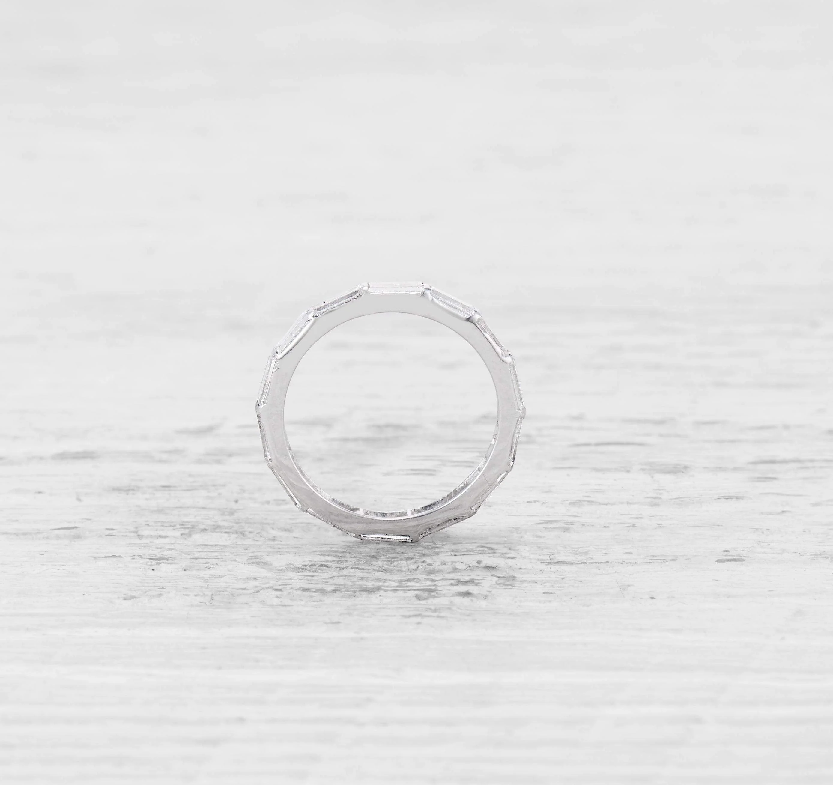 VINTAGE BAGUETTE CUT DIAMOND AND PLATINUM ETERNITY BAND - Image 2