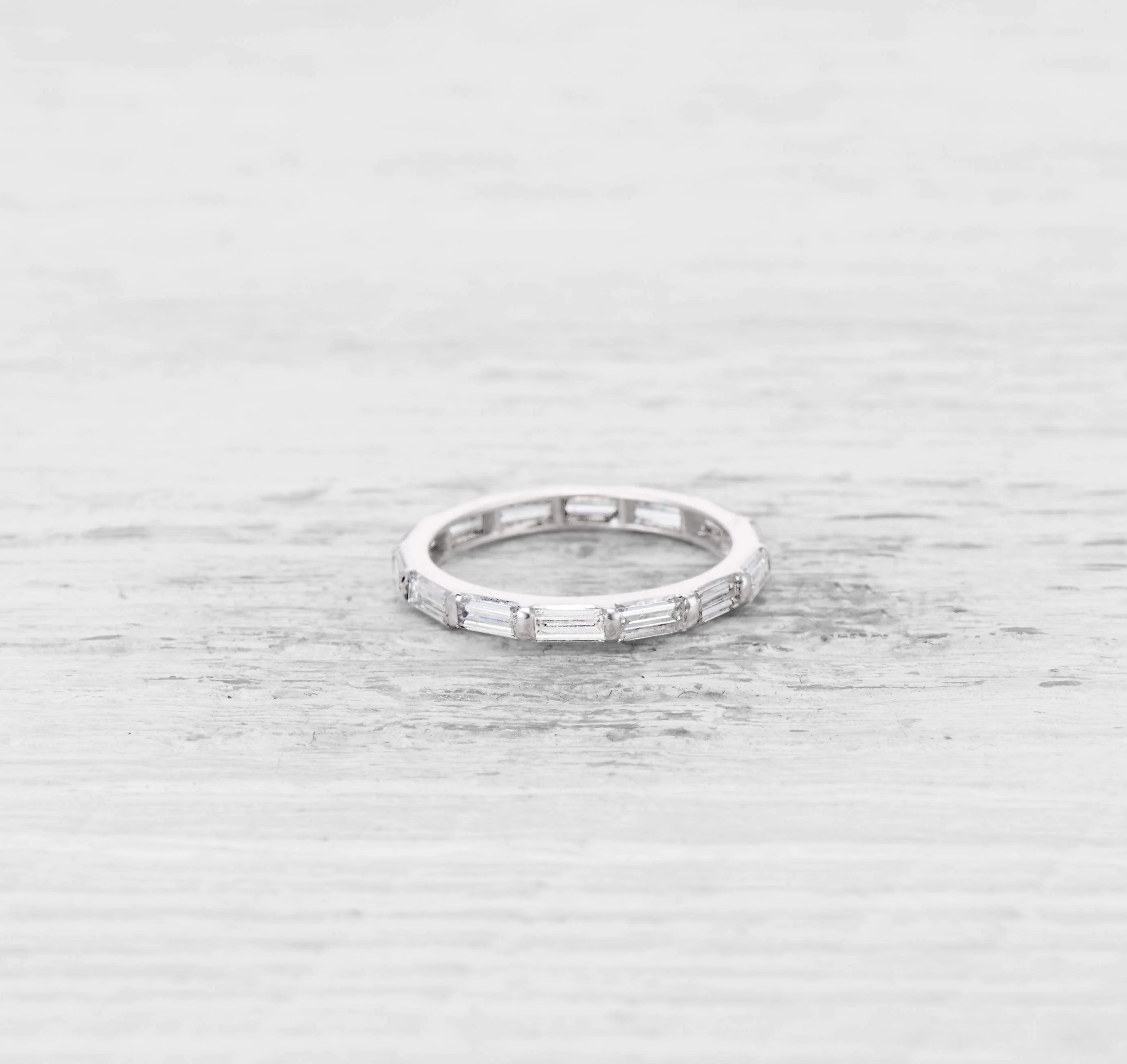 VINTAGE BAGUETTE CUT DIAMOND AND PLATINUM ETERNITY BAND - Image 3